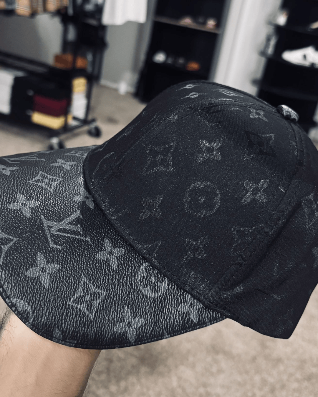 Louis Vuitton Monogram black luxury baseball cap, premium designer streetwear hat with monogram pattern and adjustable fit.
