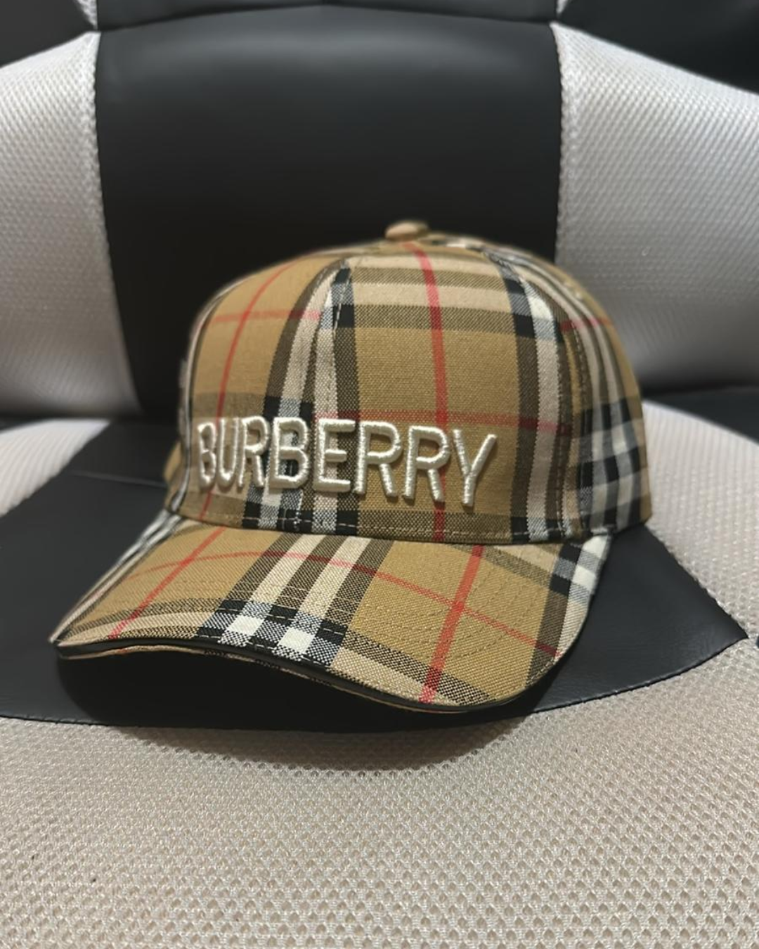 Vintage Burberry check baseball cap by Luxivio, unisex luxury designer hat with classic plaid pattern and curved brim.