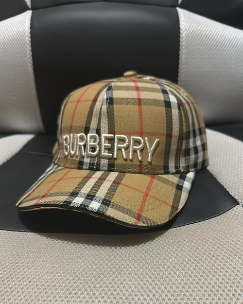 Vintage Burberry check baseball cap by Luxivio, unisex luxury designer hat with classic plaid pattern and curved brim.
