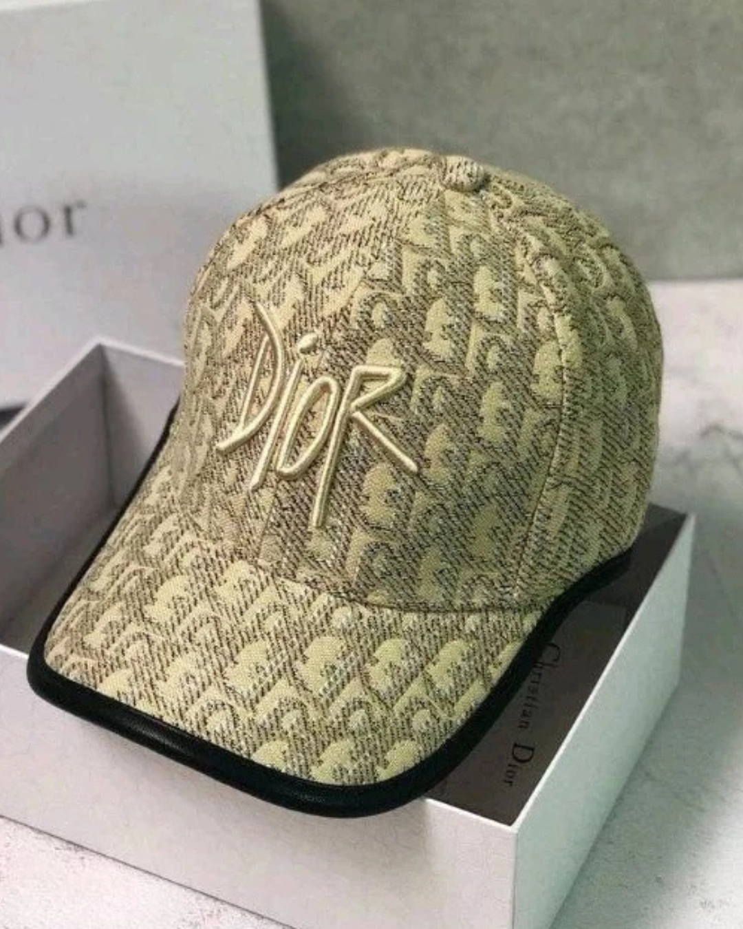 Dior Oblique embroidered luxury baseball cap with designer streetwear style, featuring Dior logo and classic pattern.