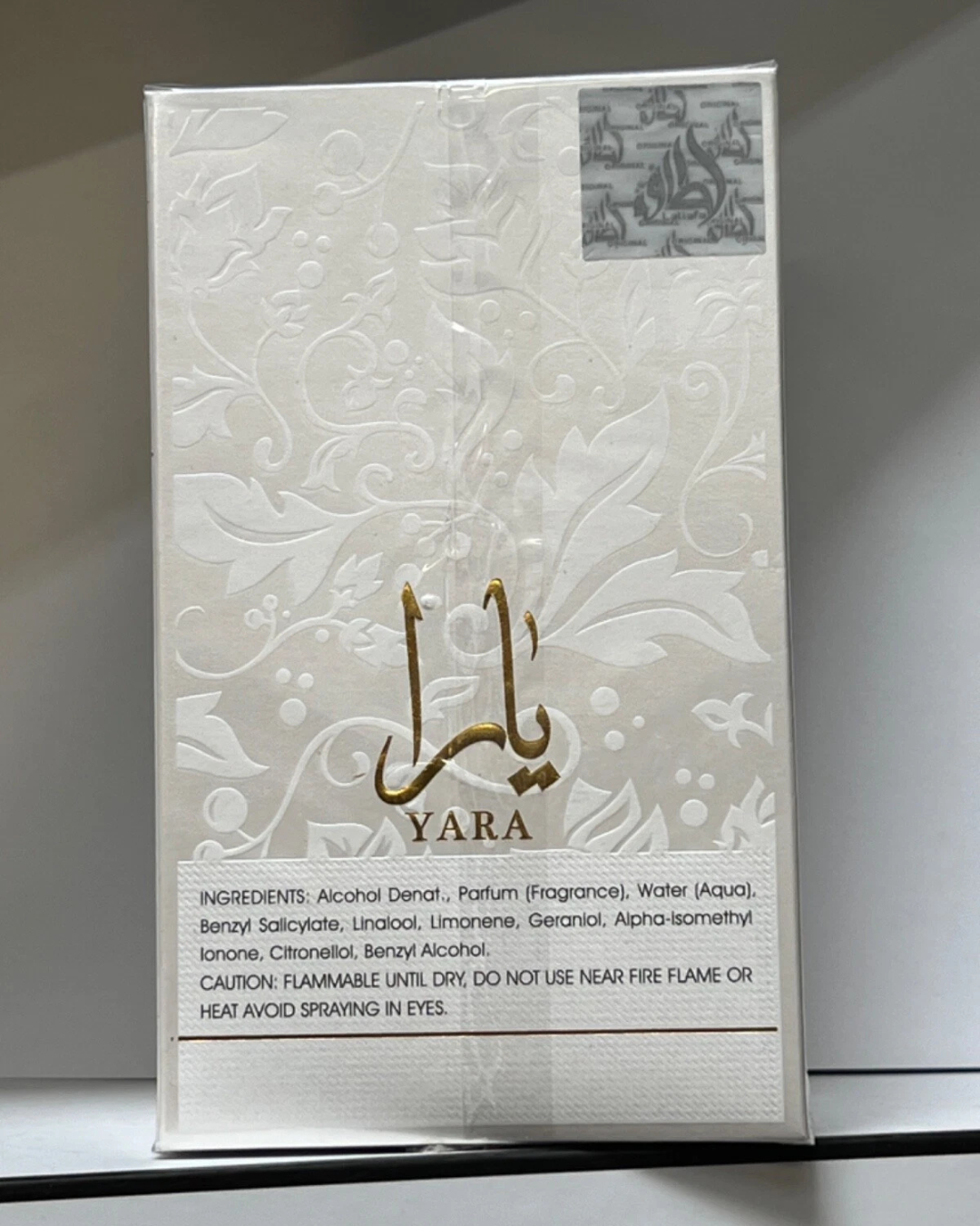 Lattafa Yara Moi Eau De Parfum bottle with luxurious, creamy, sweet scent design for women, 100ml Luxivio fragrance.