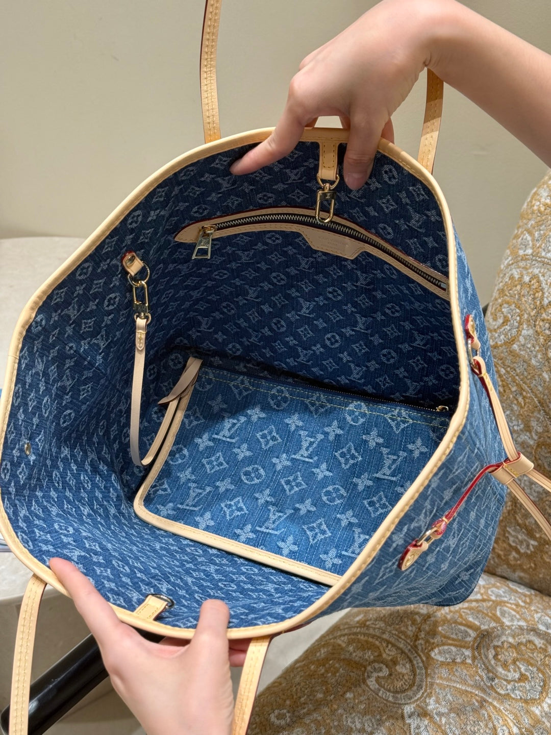 Louis Vuitton Denim Monogram Neverfull Tote Bag showing the spacious interior and signature monogram canvas design.